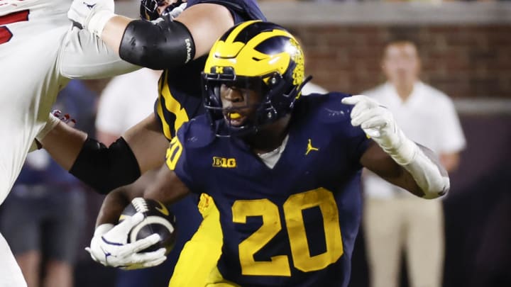 Aug 31, 2024; Ann Arbor, Michigan, USA;  Michigan Wolverines running back Kalel Mullings (20) rushes in the second half against the Fresno State Bulldogs at Michigan Stadium. Mandatory Credit: Rick Osentoski-USA TODAY Sports