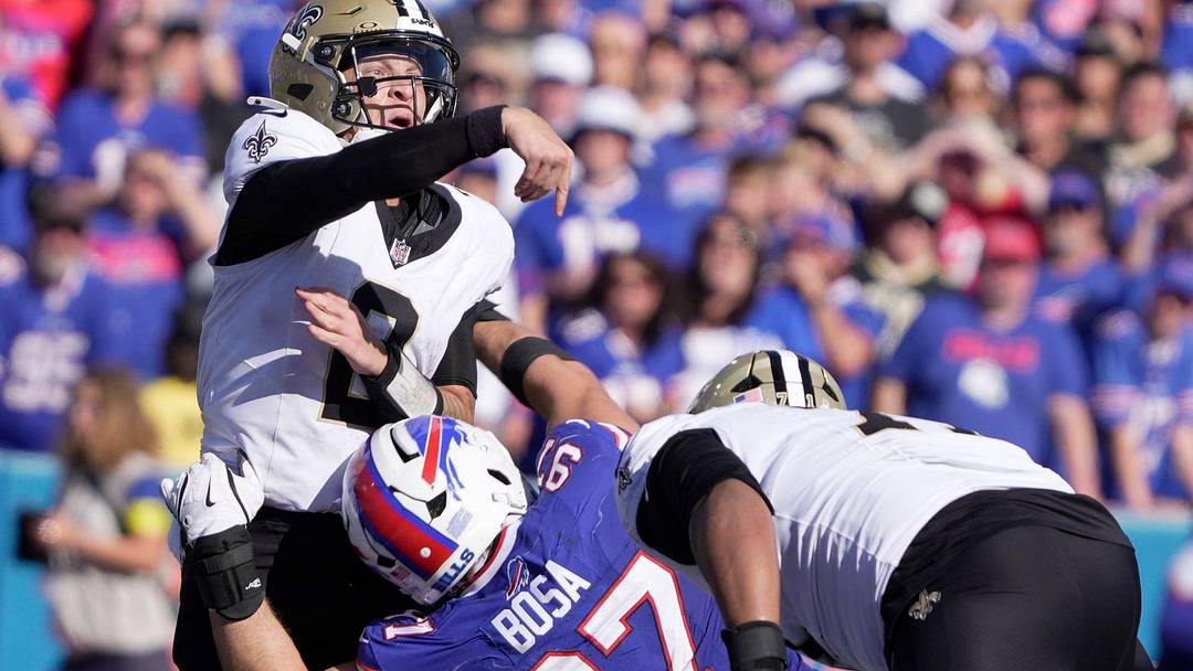 Buffalo Bills defensive end Joey Bosa pressures New Orleans Saints quarterback Spencer Rattler into throwing a pass out of bounds during second half action of the Bills home game against the New Orleans Saints in Orchard Park on Sept. 28, 2025. Buffalo Bills defensive end Joey Bosa pressures New Orleans Saints quarterback Spencer Rattler into throwing a pass out of bounds during second half action of the Bills home game against the New Orleans Saints in Orchard Park on Sept. 28, 2025.