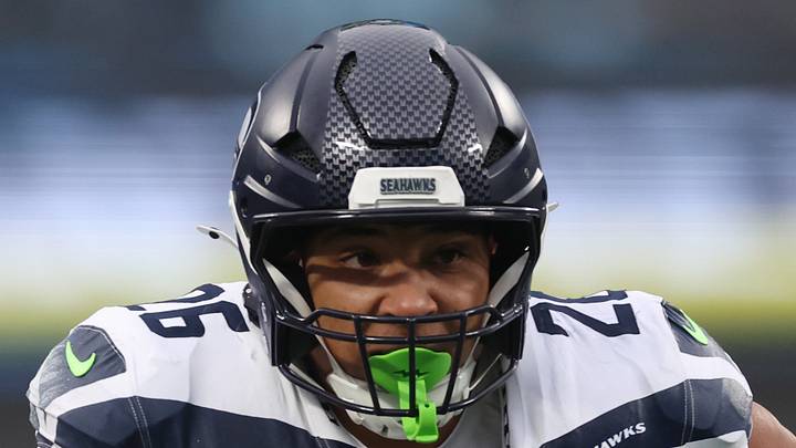 Zach Charbonnet of the Seattle Seahawks runs
