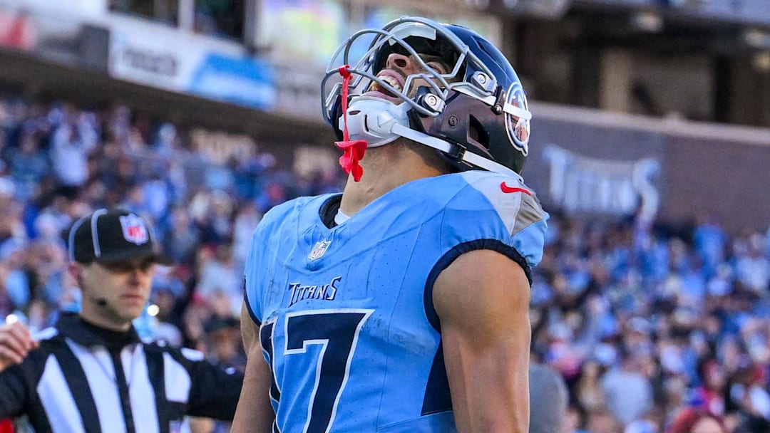 Dec 21, 2025; Nashville, Tennessee, USA;  Tennessee Titans wide receiver Chimere Dike (17) celebrates his touchdown against the Kansas City Chiefs during the second half at Nissan Stadium. Mandatory Credit: Steve Roberts-Imagn Images