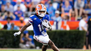 Sep 14, 2024; Gainesville, Florida, USA; Florida Gators wide receiver Tank Hawkins (10) runs with the ball against the Texas A&M Aggies during the second half at Ben Hill Griffin Stadium. Mandatory Credit: Matt Pendleton-Imagn Images