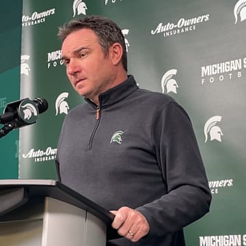 Michigan State head coach Jonathan Smith listens to a question being asked during a press conference on Nov. 10, 2025.
