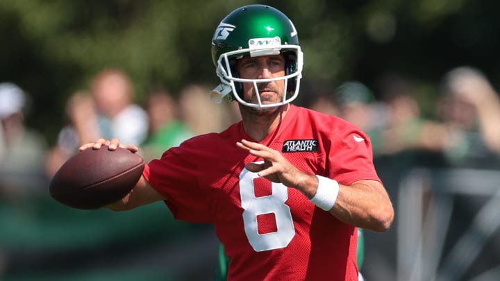 Jul 27, 2024; Florham Park, NJ, USA; New York Jets quarterback Aaron Rodgers (8) throws the ball during training camp at Atlantic Health Jets Training Center.