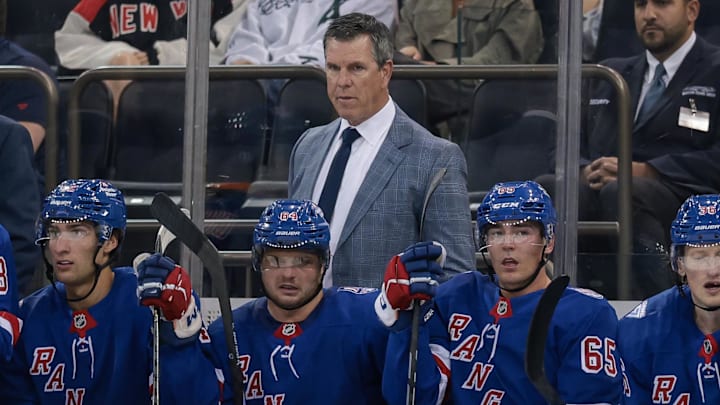 Sep 23, 2025; New York, New York, USA; New York Rangers head coach Mike Sullivan looks on during the first period of a preseason game against the Boston Bruins at Madison Square Garden. Mandatory Credit: Vincent Carchietta-Imagn Images