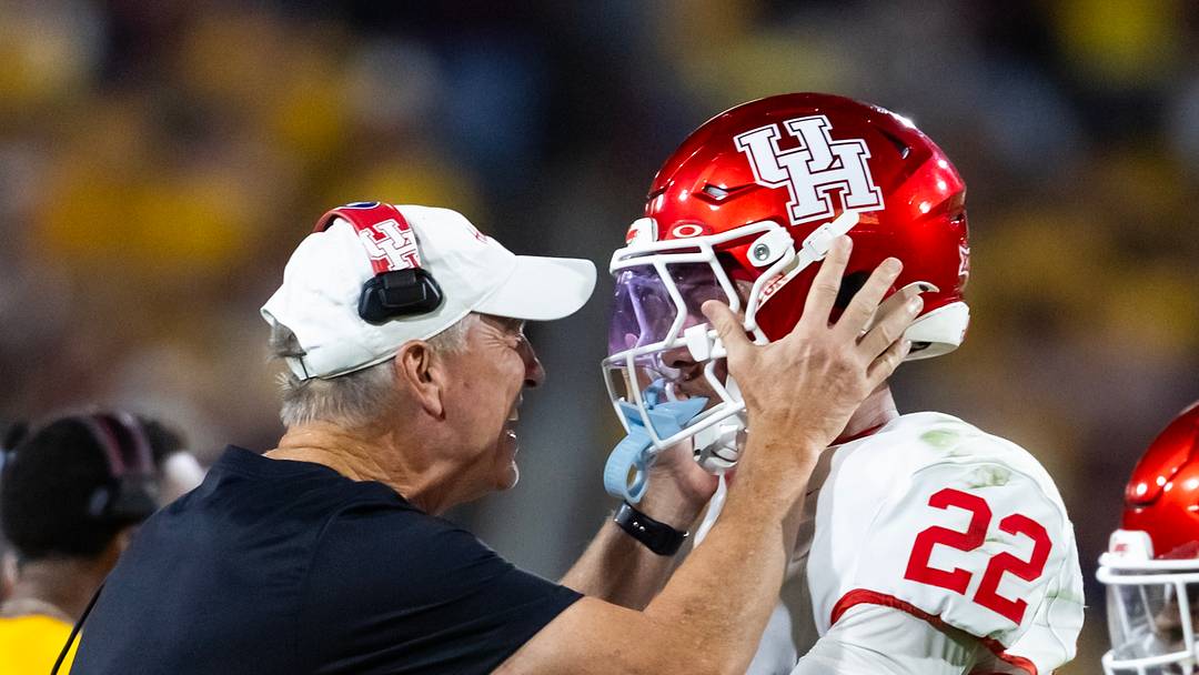 Oct 25, 2025; Tempe, Arizona, USA; Houston Cougars head coach Willie Fritz celebrates a play with defensive back Marc Stampley II (22) against the Arizona State Sun Devils at Mountain America Stadium. Mandatory Credit: Mark J. Rebilas-Imagn Images Oct 25, 2025; Tempe, Arizona, USA; Houston Cougars head coach Willie Fritz celebrates a play with defensive back Marc Stampley II (22) against the Arizona State Sun Devils at Mountain America Stadium. Mandatory Credit: Mark J. Rebilas-Imagn Images