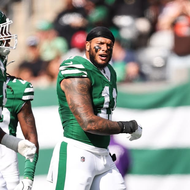 New York Jets linebacker Jermaine Johnson celebrates a defensive stop in the first quarter against the Carolina Panthers 