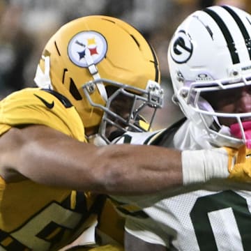 Green Bay Packers wide receiver Matthew Golden is tackled during the game against the Pittsburgh Steelers.