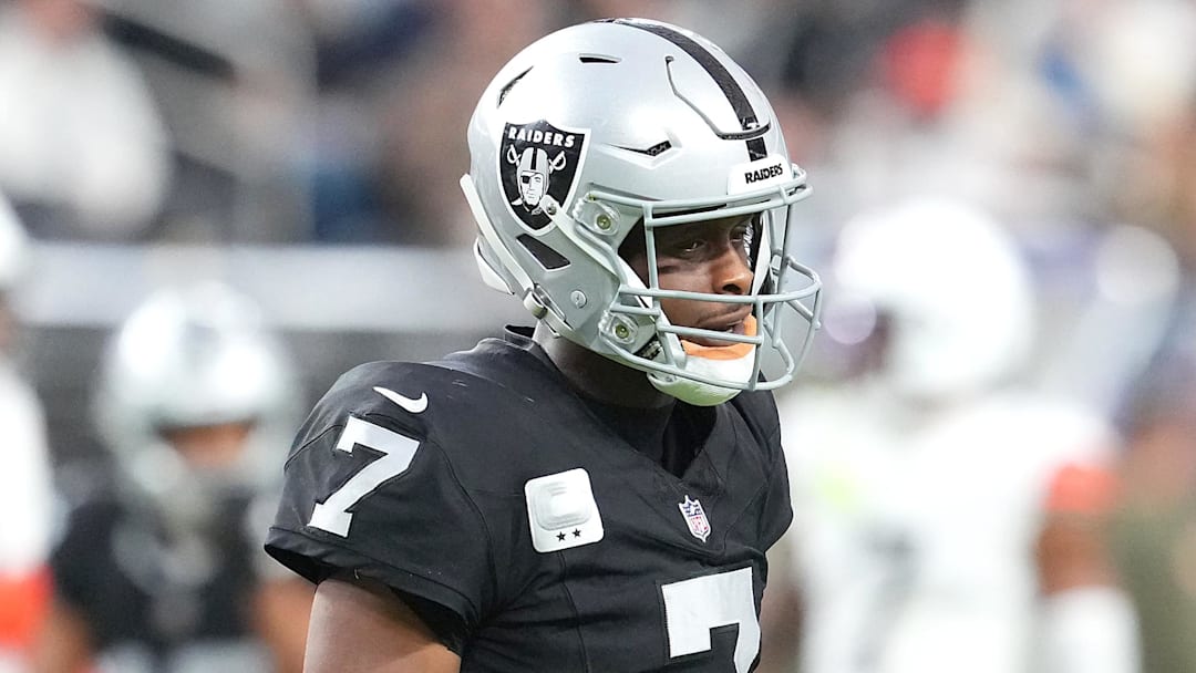 Nov 23, 2025; Paradise, Nevada, USA; Las Vegas Raiders quarterback Geno Smith (7) reacts after being sacked by the Cleveland Browns during the fourth quarter at Allegiant Stadium. Mandatory Credit: Stephen R. Sylvanie-Imagn Images