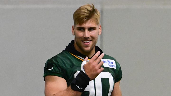 Green Bay Packers defensive end Lukas Van Ness (90) participates in the team's minicamp. Green Bay Packers defensive end Lukas Van Ness (90) participates in the team's minicamp.