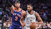 Nets forward Mikal Bridges looks to drive past Knicks guard Josh Hart in the second quarter at Madison Square Garden.