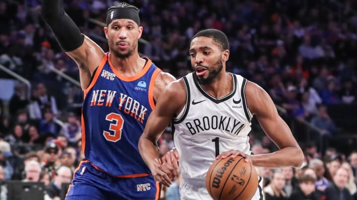 Nets forward Mikal Bridges looks to drive past Knicks guard Josh Hart in the second quarter at Madison Square Garden.