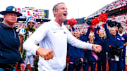 Oct 25, 2025; Norman, Oklahoma, USA;  Ole Miss Rebels head coach Lane Kiffin celebrates with fans after the game against the Oklahoma Sooners at Gaylord Family-Oklahoma Memorial Stadium. Mandatory Credit: Kevin Jairaj-Imagn Images