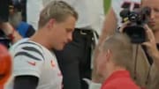 Cincinnati Bengals quarterback Joe Burrow talks with Kansas City Chiefs defensive coordinator Steve Spagnuolo.