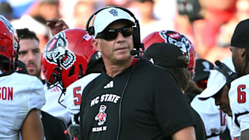 Sep 20, 2025; Durham, North Carolina, USA;  NC State Wolfpack head coach Dave Doeren during the second quarter against the Duke Blue Devils at Wallace Wade Stadium. Mandatory Credit: Zachary Taft-Imagn Images