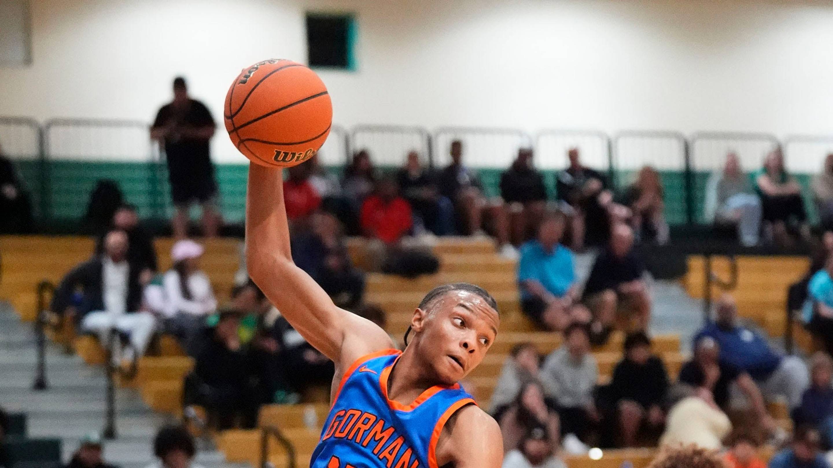 Bishop Gorman (Las Vegas, NV) Kameron Cooper (14) rebounds the ball against the Sunnyslope Vikings during the first round of the Hoophall West National High School Basketball Tournament on Jan. 1, 2026, at Skyline High School in Mesa. | Rob Schumacher/The Republic / USA TODAY NETWORK via Imagn Image