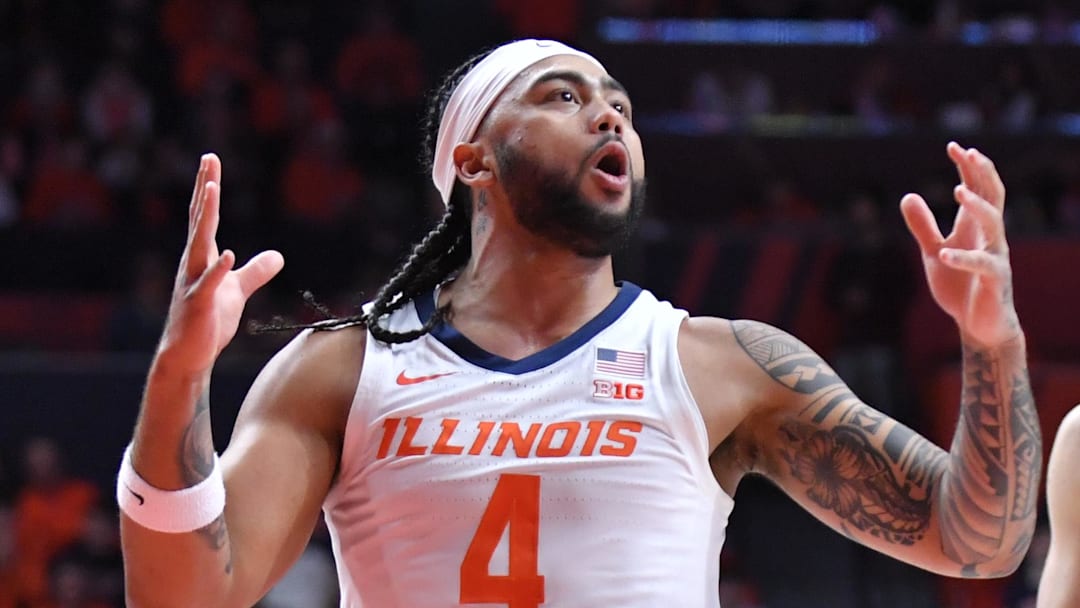 Jan 17, 2026; Champaign, Illinois, USA;  Illinois Fighting Illini guard Kylan Boswell (4) loses the ball as he drives the lane during the first half against the Minnesota Golden Gophers  at State Farm Center. Mandatory Credit: Ron Johnson-Imagn Images