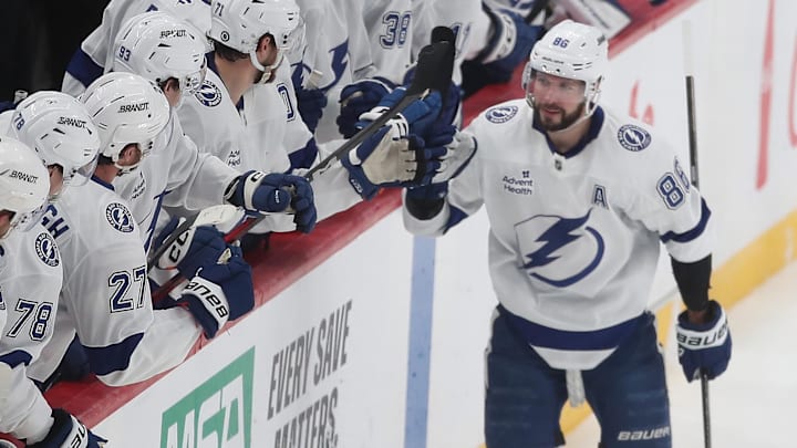 Jan 12, 2025; Pittsburgh, Pennsylvania, USA; Tampa Bay Lightning right wing Nikita Kucherov (86) celebrates his goal with the Lightning bench against the Pittsburgh Penguins during the second period at PPG Paints Arena. Mandatory Credit: Charles LeClaire-Imagn Images