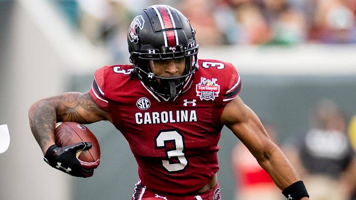 Dec 30, 2022; Jacksonville, FL, USA; South Carolina Gamecocks wide receiver Antwane Wells Jr. (3) runs with the ball during the first half against the Notre Dame Fighting Irish in the 2022 Gator Bowl at TIAA Bank Field. Mandatory Credit: Matt Pendleton-Imagn Images