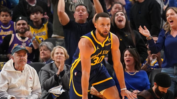 Feb 22, 2024; San Francisco, California, USA; Golden State Warriors guard Stephen Curry (30) reacts after making a layup against the Los Angeles Lakers in the second quarter at the Chase Center. Mandatory Credit: Cary Edmondson-USA TODAY Sports