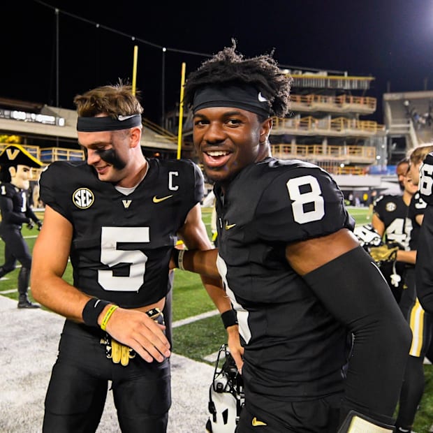 Vanderbilt Commodores wide receiver Richie Hoskins and quarterback Nate Johnson celebrate after defeating Alcorn State.