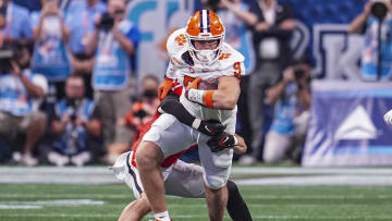 Aug 31, 2024; Atlanta, Georgia, USA; Clemson Tigers tight end Jake Briningstool (9) tries to break a tackle by Georgia Bulldogs defensive back Dan Jackson (17) during the first quarter at Mercedes-Benz Stadium. Mandatory Credit: Dale Zanine-USA TODAY Sports