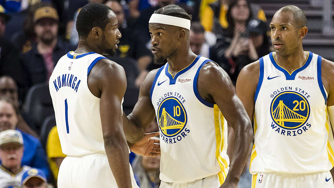 Oct 8, 2025; San Francisco, California, USA;  Golden State Warriors forward Jimmy Butler III (10) reacts  towards forward Jonathan Kuminga (1) during the second quarter against the Portland Trail Blazers at Chase Center. Mandatory Credit: John Hefti-Imagn Images