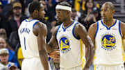 Oct 8, 2025; San Francisco, California, USA;  Golden State Warriors forward Jimmy Butler III (10) reacts  towards forward Jonathan Kuminga (1) during the second quarter against the Portland Trail Blazers at Chase Center. Mandatory Credit: John Hefti-Imagn Images
