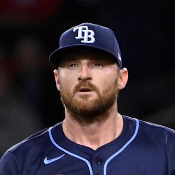 Tampa Bay Rays relief pitcher Bryan Baker (47) looks on from the mound during the seventh inning against the Boston Red Sox at Fenway Park.