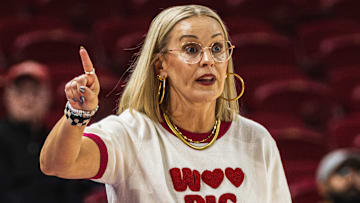Arkansas Razorbacks coach Kelsi Musick on the sidelines in an exhibition game against Arkansas-Fort Smith.