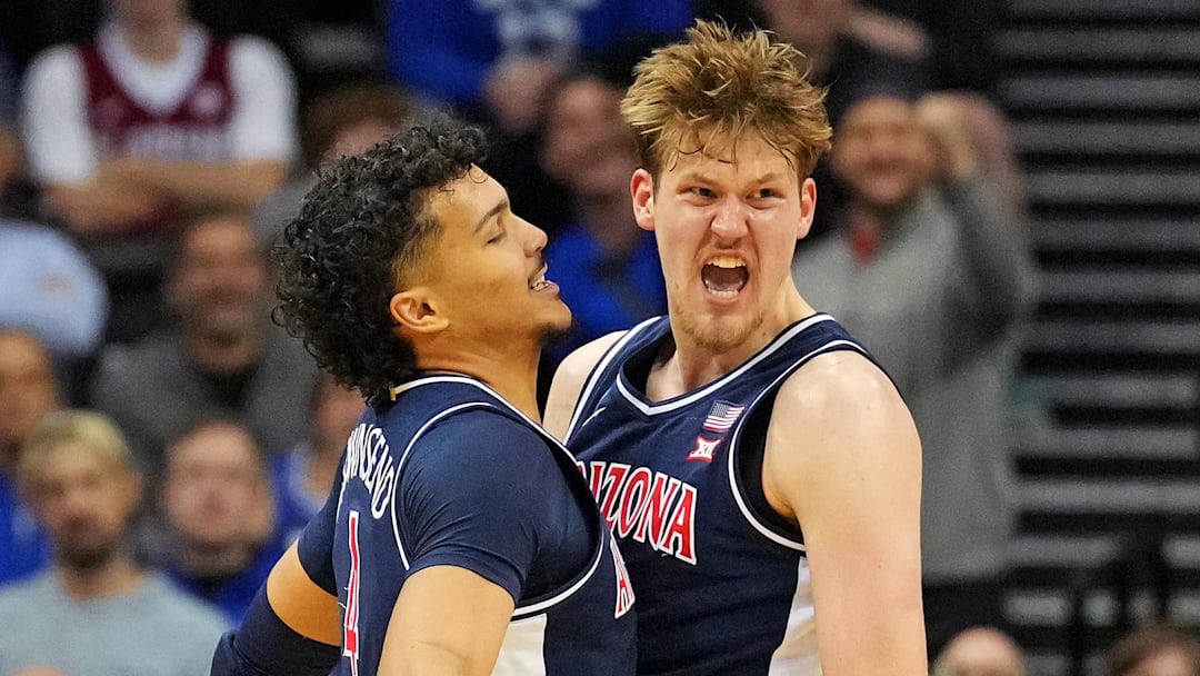 Arizona Wildcats forward Henri Veesaar (13) celebrates with Arizona Wildcats forward Trey Townsend (4) after a play against the Duke Blue Devils during an East Regional semifinal of the 2025 NCAA tournament.