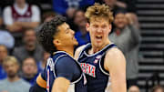 Arizona Wildcats forward Henri Veesaar (13) celebrates with Arizona Wildcats forward Trey Townsend (4) after a play against the Duke Blue Devils during an East Regional semifinal of the 2025 NCAA tournament.