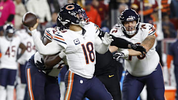 Oct 27, 2024; Landover, Maryland, USA; Chicago Bears quarterback Caleb Williams (18) passes the ball against the Washington Commanders during the third quarter at Northwest Stadium. Mandatory Credit: Geoff Burke-Imagn Images