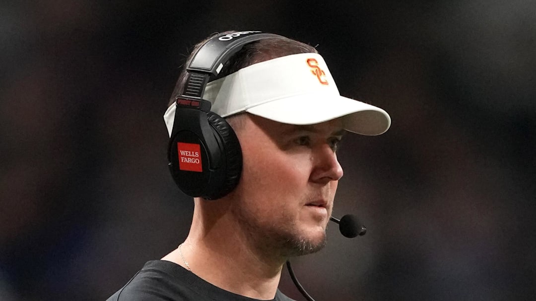 Dec 30, 2025; San Antonio, TX, USA; Southern California Trojans head coach Lincoln Riley watches from the sidelines against the TCU Horned Frogs in the first half during the Alamo Bowl at Alamodome. Mandatory Credit: Kirby Lee-Imagn Images Dec 30, 2025; San Antonio, TX, USA; Southern California Trojans head coach Lincoln Riley watches from the sidelines against the TCU Horned Frogs in the first half during the Alamo Bowl at Alamodome. Mandatory Credit: Kirby Lee-Imagn Images