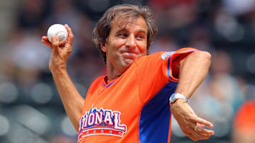 Jul 14, 2013; Flushing , NY, USA; Radio personality Christopher Russo throws out the ceremonial first pitch before the 2013 All Star Futures Game at Citi Field.