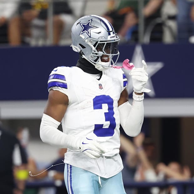 Dallas Cowboys WR George Pickens celebrates after scoring a touchdown in the fourth quarter against the Green Bay Packers.
