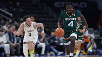 Mar 12, 2024; Washington, D.C., USA; Miami (Fl) Hurricanes guard Bensley Joseph (4) dribbles the ball as Boston College Eagles guard Jaeden Zackery (3) chases in the first half at Capital One Arena. Mandatory Credit: Geoff Burke-USA TODAY Sports