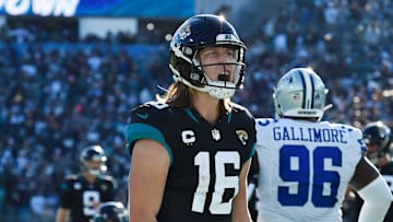 Jaguars quarterback Trevor Lawrence (16) celebrates after his touchdown pass to wide receiver Zay Jones (7) early in the fourth quarter gave the Jags the lead against the Cowboys on Dec. 18, 2022 Jacksonville eventually beat Dallas 40-34 in overtime.