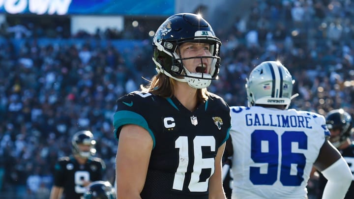 Jacksonville Jaguars quarterback Trevor Lawrence (16) celebrates after his touchdown pass to wide receiver Zay Jones (7) early in the fourth quarter at TIAA Bank Field Sunday, December 18, 2022. 