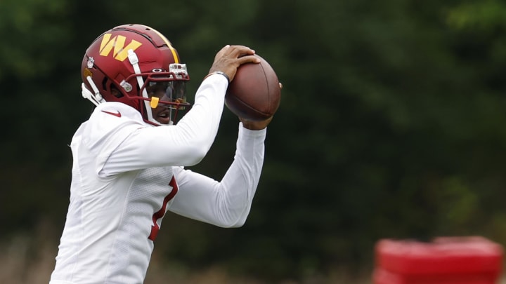 Jun 5, 2024; Ashburn, VA, USA; Washington Commanders wide receiver Jahan Dotson (1) catches a pass during OTA workouts at Commanders Park. Mandatory Credit: Geoff Burke-USA TODAY Sports