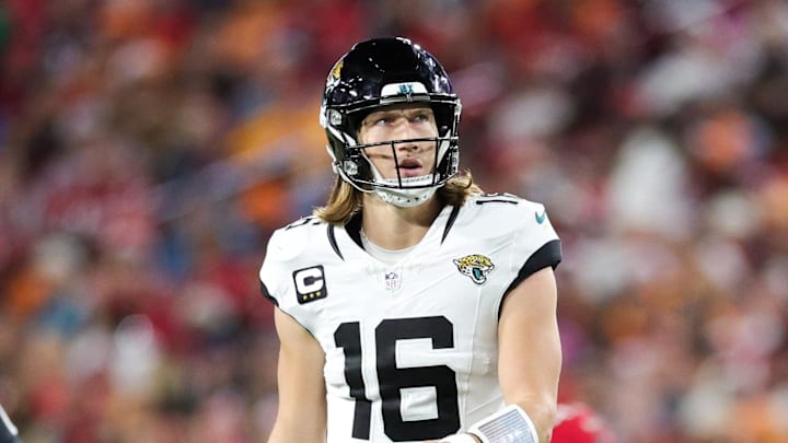 Dec 24, 2023; Tampa, Florida, USA;  Jacksonville Jaguars quarterback Trevor Lawrence (16) reacts after a play against the Tampa Bay Buccaneers in the third quarter at Raymond James Stadium. Mandatory Credit: Nathan Ray Seebeck-Imagn Images