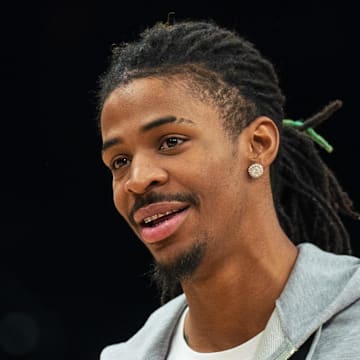 Jan 7, 2024; Phoenix, Arizona, USA;  Memphis Grizzlies guard Ja Morant (12) walks off the court after the end of the game against the Phoenix Suns at Footprint Center.  Morant did not play. 