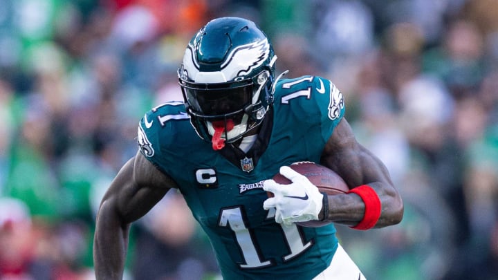 Dec 31, 2023; Philadelphia, Pennsylvania, USA; Philadelphia Eagles wide receiver A.J. Brown (11) runs with the ball during the fourth quarter against the Arizona Cardinals at Lincoln Financial Field. 