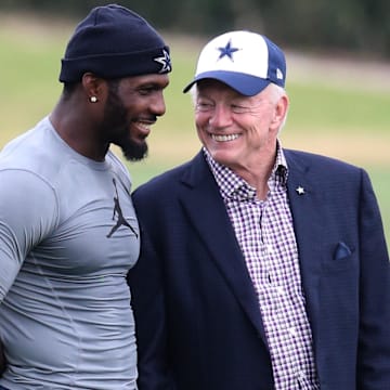 Dallas Cowboys receiver Dez Bryant talks with owner Jerry Jones after returning to organized team activities 