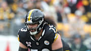 Dec 25, 2024; Pittsburgh, Pennsylvania, USA;  Pittsburgh Steelers guard Isaac Seumalo (73) at the line of scrimmage against the Pittsburgh Steelers during the second quarter during the second quarter at Acrisure Stadium. Mandatory Credit: Charles LeClaire-Imagn Images