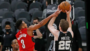 CJ McCollum Jakob Poeltl