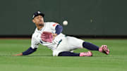 Oct 16, 2025; Seattle, Washington, USA; Seattle Mariners center fielder Julio Rodriguez (44) makes a catch in the ninth inning against the Toronto Blue Jays during game four of the ALCS round for the 2025 MLB playoffs at T-Mobile Park. Mandatory Credit: Kevin Ng-Imagn Images