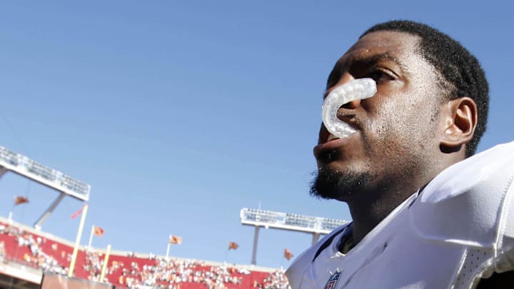 New Orleans Saints linebacker Jonathan Vilma (51) walks off the field after the game against the Tampa Bay Buccaneers at Raymond James Stadium. The Saints defeated the Buccaneers 35-28 on Oct. 21, 2012.