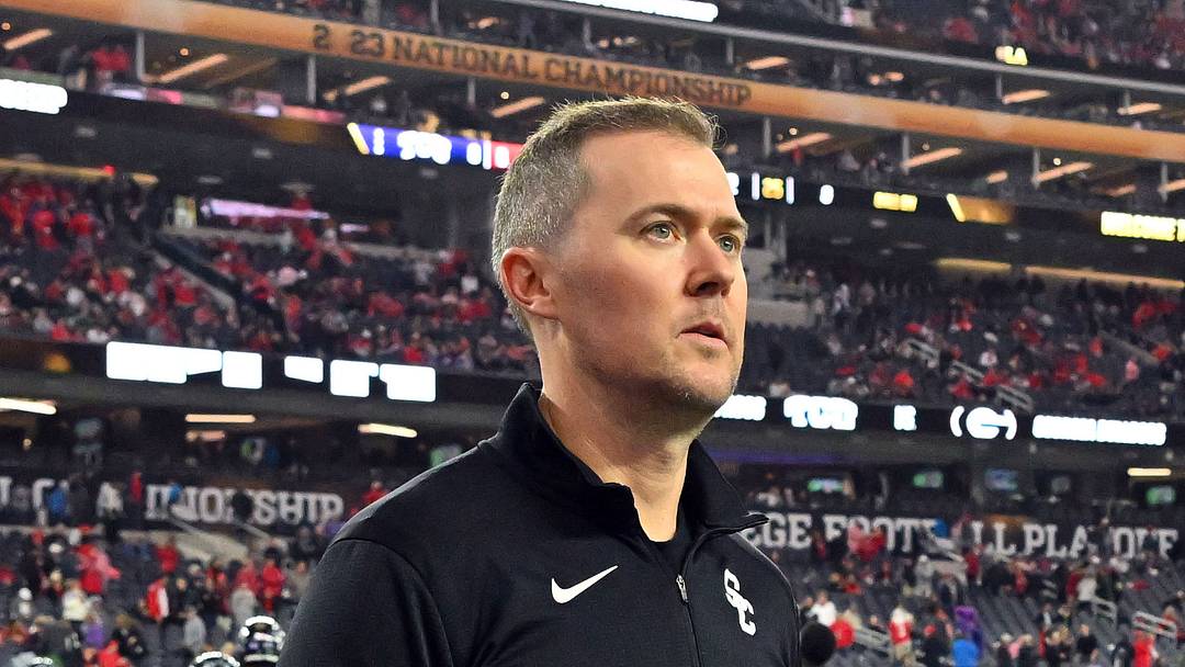 Southern California Trojans head coach Lincoln Riley walks the field before the CFP national championship game between the TCU Horned Frogs and the Georgia Bulldogs at SoFi Stadium. Southern California Trojans head coach Lincoln Riley walks the field before the CFP national championship game between the TCU Horned Frogs and the Georgia Bulldogs at SoFi Stadium.