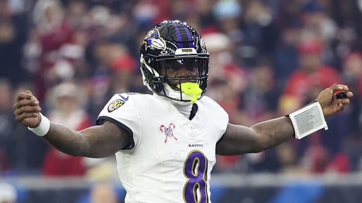 Baltimore Ravens quarterback Lamar Jackson reacts to a play. Baltimore Ravens quarterback Lamar Jackson reacts to a play.