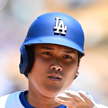 Los Angeles Dodgers designated hitter Shohei Ohtani (17) circles the bases after hitting a solo home run during the first inning against the Toronto Blue Jays at Dodger Stadium on Aug. 10. 